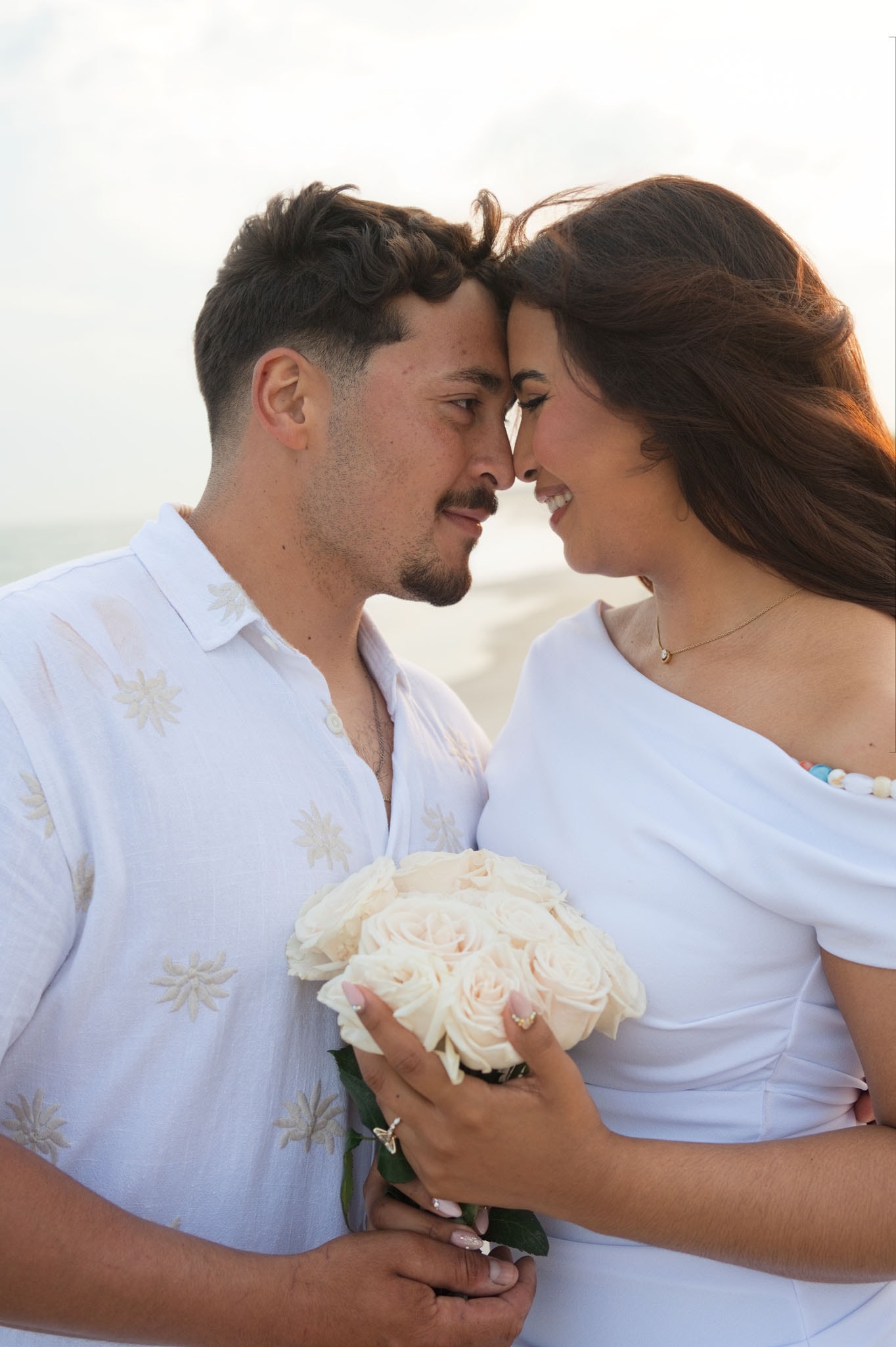 Couple laughing in golden light